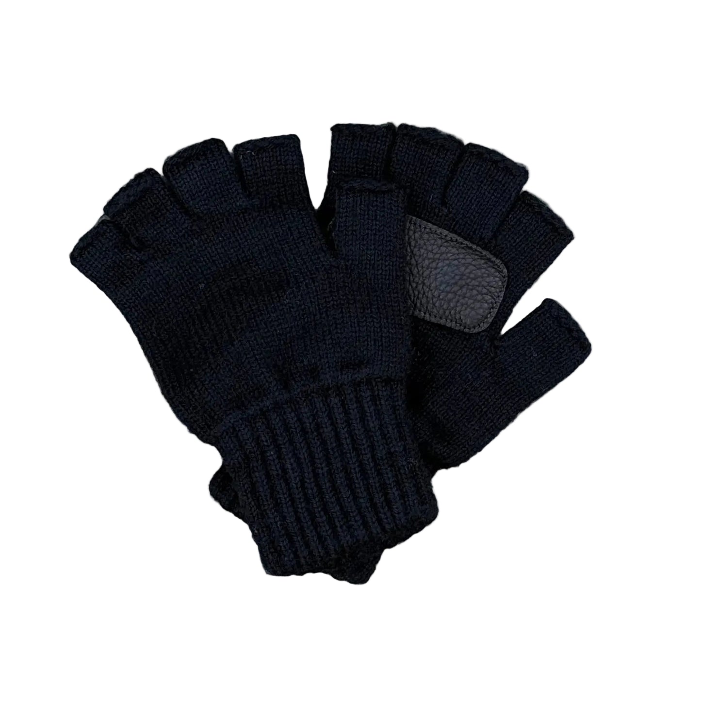 Pair of black fingerless gloves on a textured surface