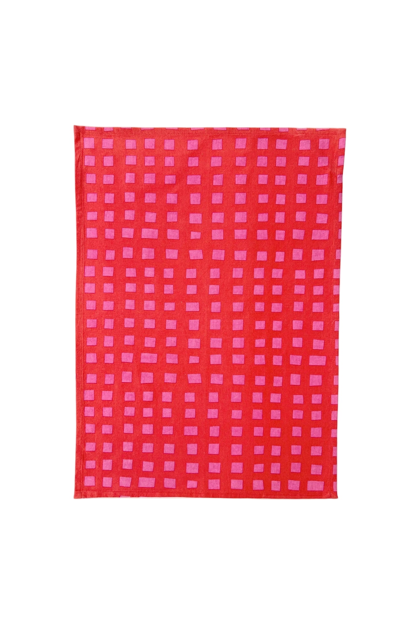 Red and pink checkered fabric on a white background