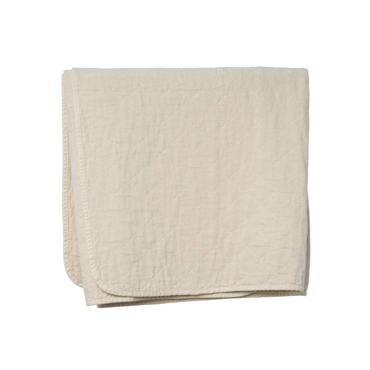 Beige quilted blanket on a white background
