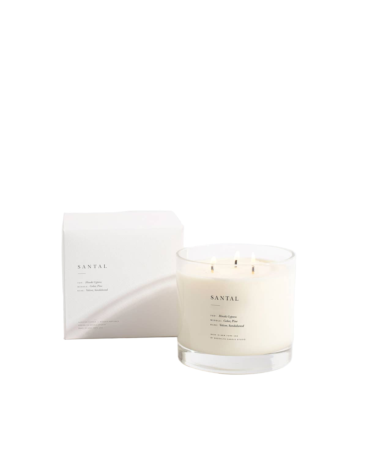 Santal candle with packaging on a white background