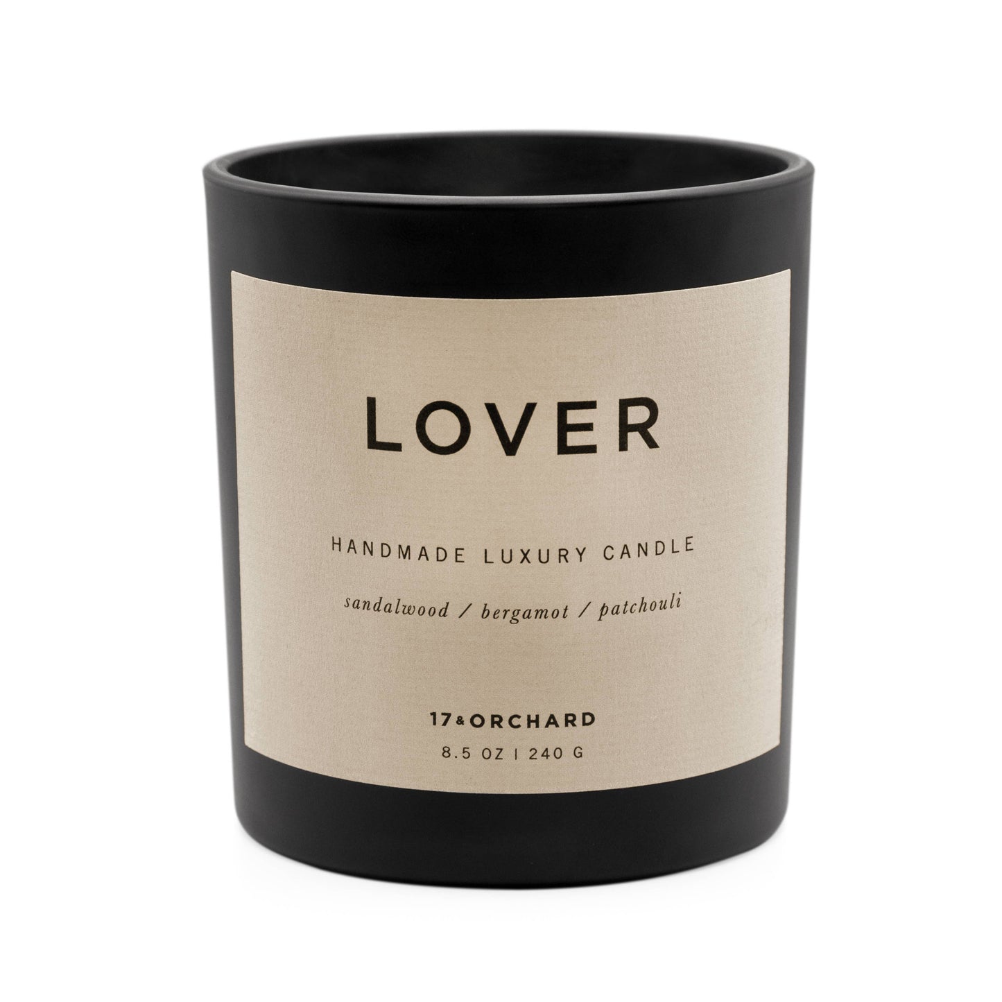17 & Orchard Handmade luxury candle labeled 'Lover' with a black and beige design on a white background.