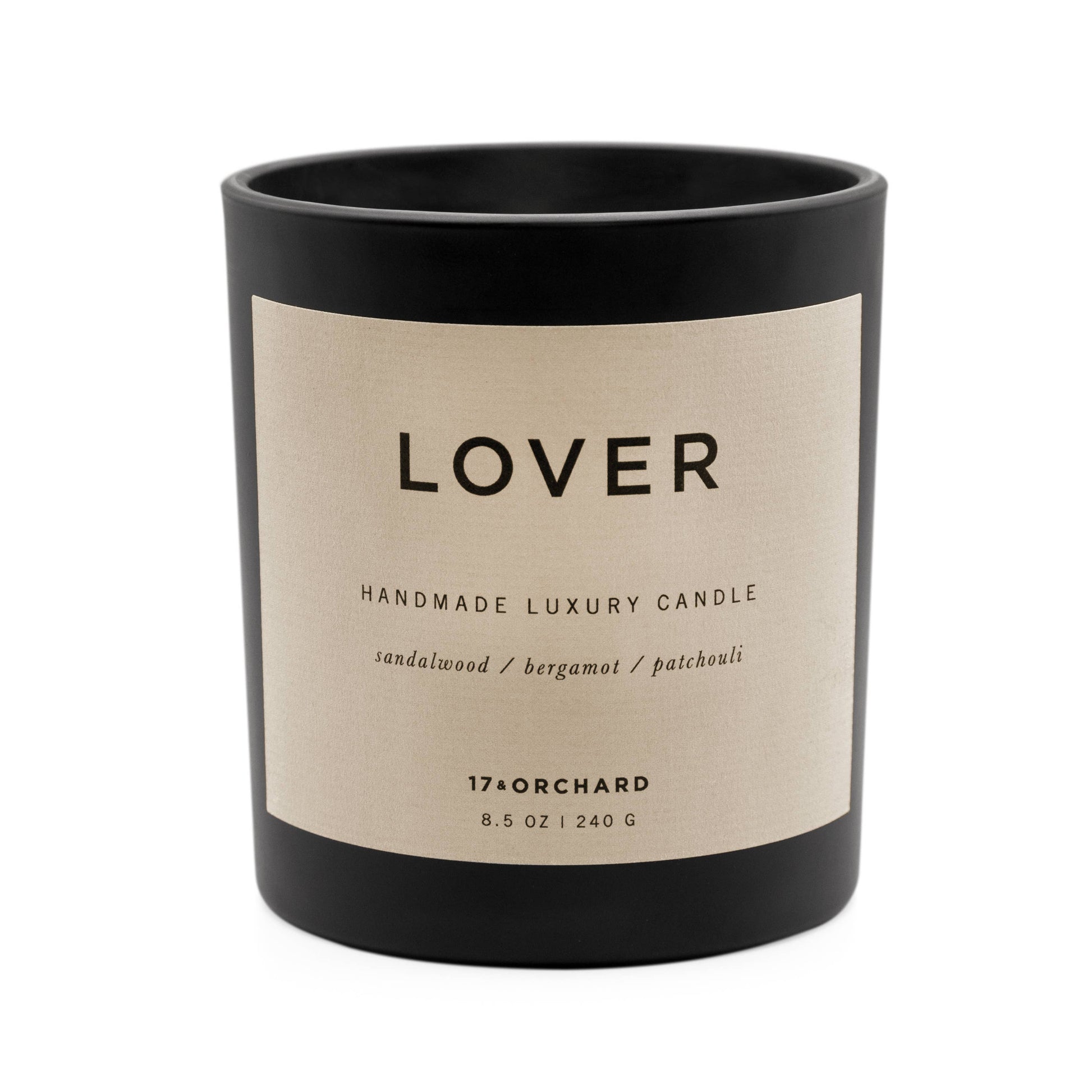 17 & Orchard Handmade luxury candle labeled 'Lover' with a black and beige design on a white background.