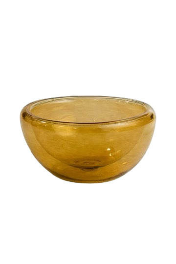 Amber glass bowl on a white background