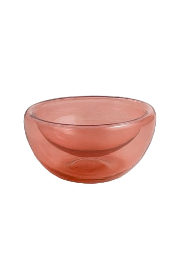 Pink glass bowl on a white background