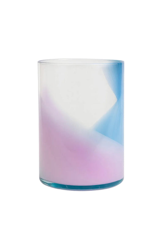 Gradient glass with blue and pink colors on a white background