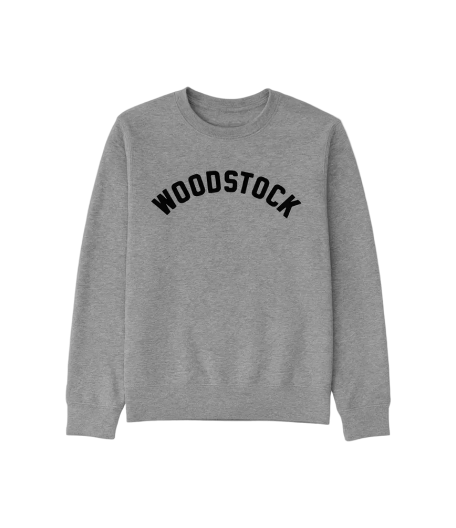 Gray sweatshirt with 'Woodstock' text on a white background