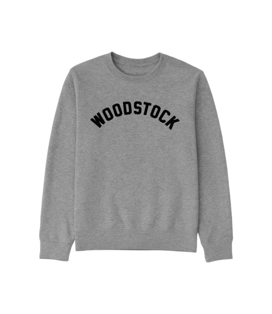 Gray sweatshirt with 'Woodstock' text on a white background