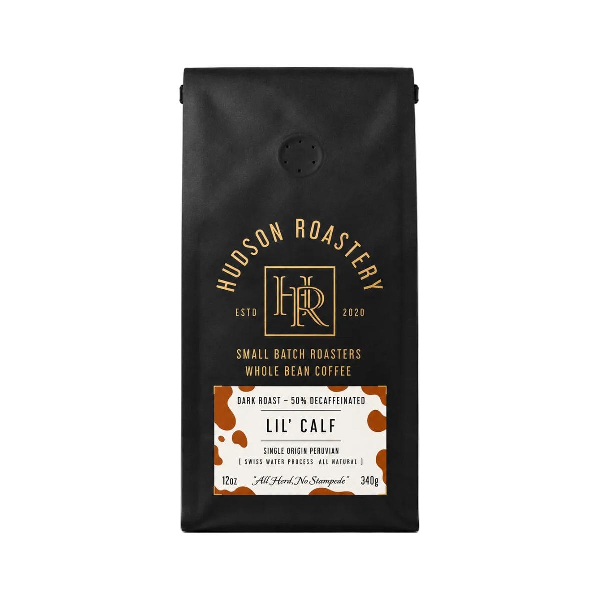 A black coffee bag from Hudson Roastery with gold lettering and a cream-and-brown label at the bottom reading 'Lil' Calf'.