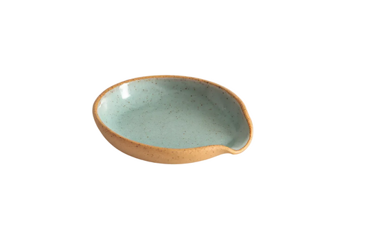 Ceramic dish with a light blue interior and brown exterior on a white background