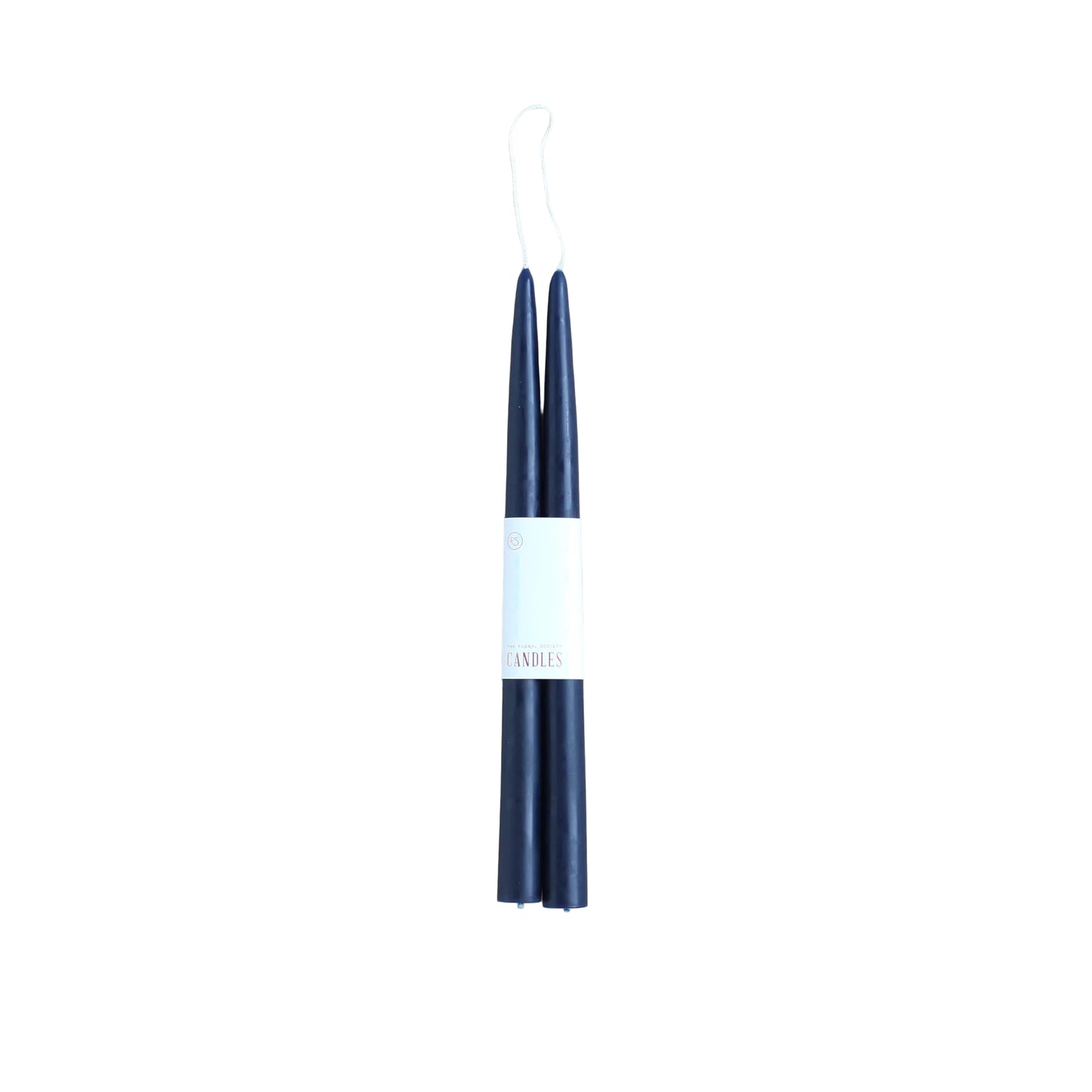 Two navy blue candles with a white label on a light gray background
