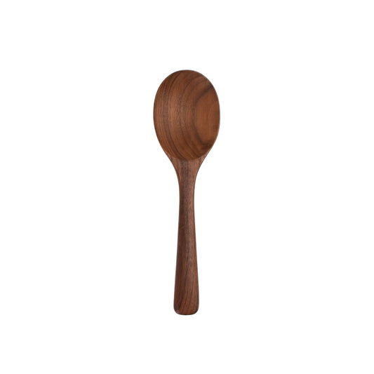 Wooden spoon on a white background