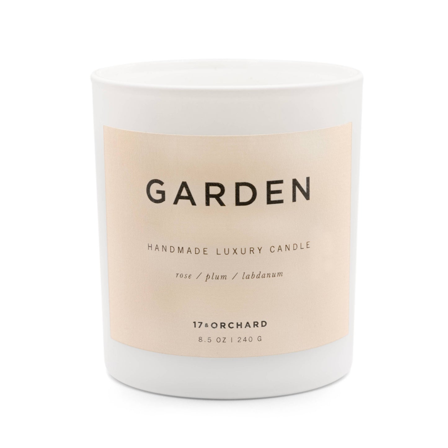 Handmade luxury candle labeled 'Garden' with a beige label on a white background