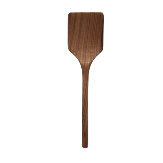 Wooden spatula on a white background